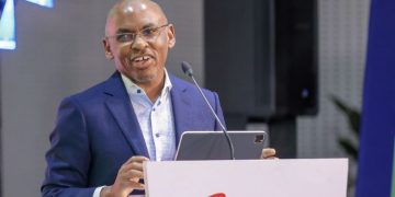 Safaricom Ceo Peter Ndegwa Speaking At A Past Company Event.