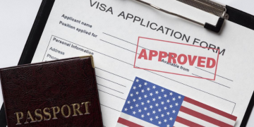 A Photo Of A Passport And Us Visa Application Form Photo/The Hindu