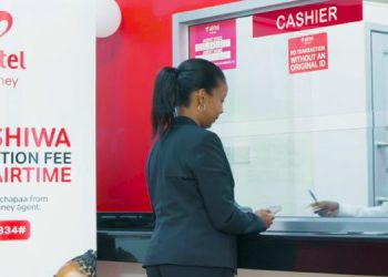 A Customer Being Attended To At An Airtel Shop.