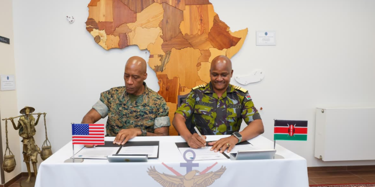 General Charles Kahariri And Us General Michael Langley Signing The Joint Communiqué From The African Chiefs Of Defence Conference (Achod) In 2025 Photo/Kdf