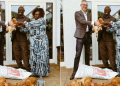 A Photo Of Kenyan Gardener Bwana Hesbon Imbwaka And German Ambassador To Kenya, Sebastian Groth Holding Chicken. Photo/ Sebastian Groth
