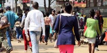 Nairobi Residents Walking Along The Streets.