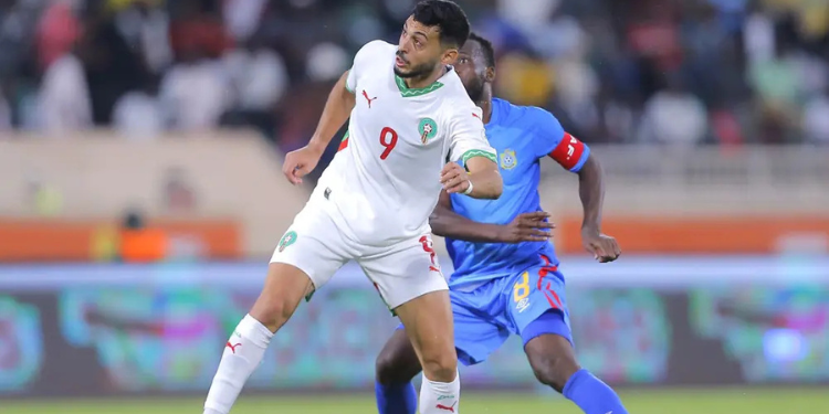 15 Players Leading Chan 2024 Top Scorers Race Ahead Of Finals An Image Showing Oussama Lamlioui Of Morocco In Action Against Miche Mika Miche Of Dr Congo. Photo/ Caf