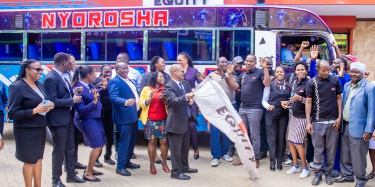 How Chama Of Rongai Bodaboda Riders Made Millions And Bought A Matatu Moses Munene, Equity Bank Rongai Branch Manager Hands Over A Bus To Members Of Nyoroma Self Help Group Outside Equity Bank Kenya Rongai Branch.