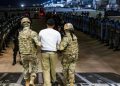 Us Military Personnel Escort An Alleged Gang Member Deported By The Us.