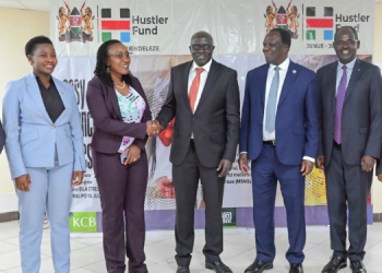 New Hustler Fund Ceo Henry Tanui, Fourth From Left, Cooperative Cs Wickliffe Oparanya And Other Officials. Photo/ File