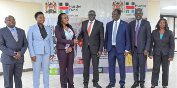 New Hustler Fund Ceo Henry Tanui, Fourth From Left, Cooperative Cs Wickliffe Oparanya And Other Officials. Photo/ File