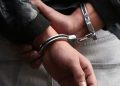 Man In Handcuffs After Arrest.