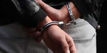 Man In Handcuffs After Arrest.