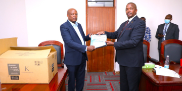 Photo Of Dci Handing Mutual Legal Assistance (Mla) To Tanzanian Authorities