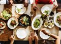 A Group Of People Enjoying A Meal.