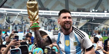 Lionel Messi Lifting The World Cup Trophy In 2022. Photo/ Fifa