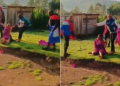 Screen Grab Of Men Dragging The Woman On The Ground. Photo/ Screen Grab