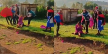 Screen Grab Of Men Dragging The Woman On The Ground. Photo/ Screen Grab