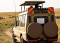 A Tourists Landcruiser In A Safari