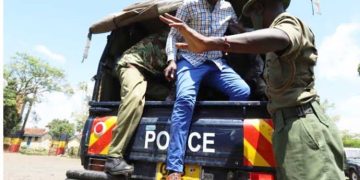 A Man Being Arrested By Police.