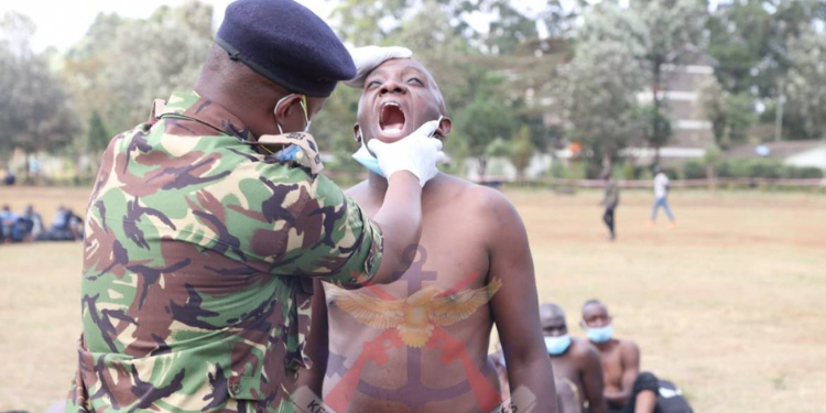 Man Posing As Kdf Brigadier Caught Conning Youth With Fake Recruitment Letters A Photo Of A Police Officer During The Kdf Recruitment Photo/Kdf