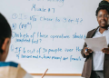 A Photo Of A Teacher In Class With Teaching.