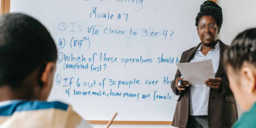 A Photo Of A Teacher In Class With Teaching.