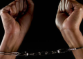 A Photo Of A Woman In Handcuffs Photo/Istock