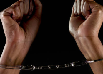 A Photo Of A Woman In Handcuffs Photo/Istock