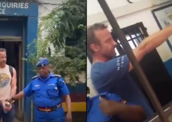 Public Outrage As Foreign National Caught On Video Abusing And Spitting On Kenyan Police Officer