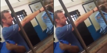 Uproar As Video Of Foreigner Humiliating And Spitting On Kenyan Police Officer Goes Viral Public Outrage As Foreign National Caught On Video Abusing And Spitting On Kenyan Police Officer