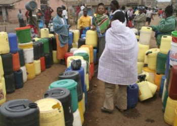Residents Lining Up To Get Water From Water Vendors. Nairobi Water