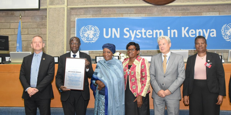 Meet Michael Ndurumo, First Deaf Professor In East Africa And Un Person Of The Year Professor Michael Ndurumo Receiving The Un In Kenya Person Of The Year Award From Director-General, Un Office At Nairobi( Unon) Mrs Zainab Hawa Bangura Photo/Un