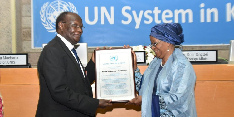 Meet Michael Ndurumo, First Deaf Professor In East Africa And Un Person Of The Year Professor Michael Ndurumo Receiving The Un In Kenya Person Of The Year Award From Director-General, Un Office At Nairobi( Unon) Mrs Zainab Hawa Bangura Photo/Un