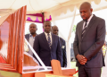 A Photo Of Murkomen Viewing Raila’s Body. Photo/ Murkomen