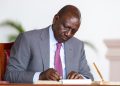 President William Ruto Signs A Document At State House. Photo/Pcs.