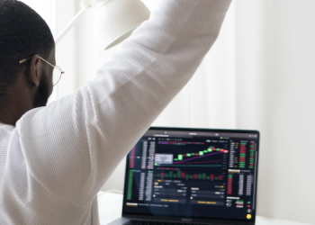 A Forex Trader Monitoring Trends. Photo-Handout