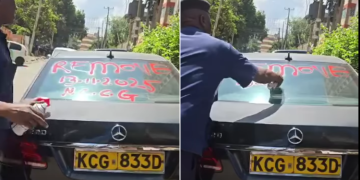 Nairobi Kanjos Start Spray-Painting Cars Parked Illegally Nairobi City Council Kanjo Spraying A Parked Car'S Windscreen. Photo/Sikikafb